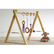 /Etsy Montessori play educational, or baby gym purple version, 4 rattles.