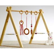 BbCamino Quiet playset, baby gym, red and grey version, 4 rattles, spheres in wood on the sides.