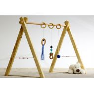 BbCamino Portico of awakening, baby gym blue version, 3 rings and spheres in wood on the sides.