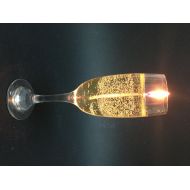 Brindisbcn Candle champagne, scented with aromatic essences, size 22 cm high x 5 diameter.