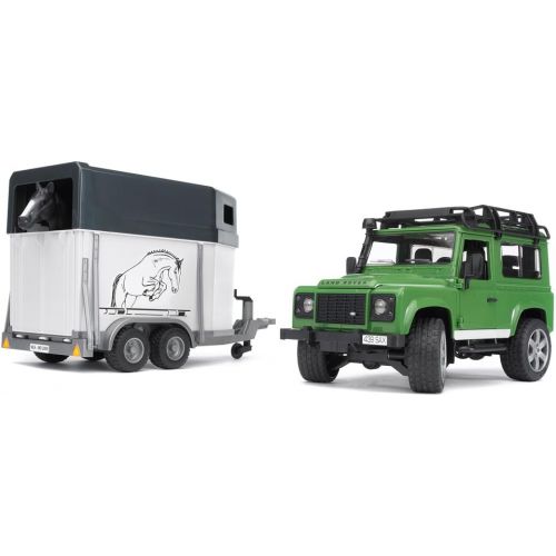  Bruder Toys Land Rover Defender w trailer snowmobile and DRIVER