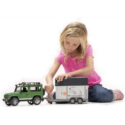  Bruder Toys Land Rover Defender w trailer snowmobile and DRIVER