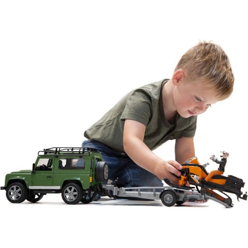  Bruder Toys Land Rover Defender w trailer snowmobile and DRIVER