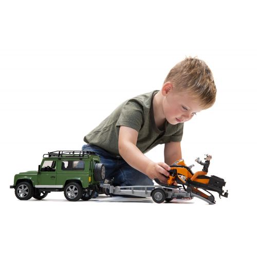  Bruder Toys Land Rover Defender w trailer snowmobile and DRIVER