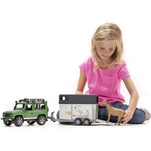  Bruder Toys Land Rover Defender w trailer snowmobile and DRIVER