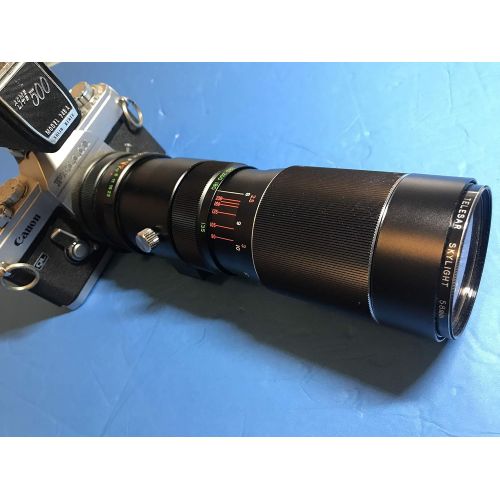 캐논 Canon Pellix 35mm SLR Film Camera with Canon Fl 35mm F2.5 Lens