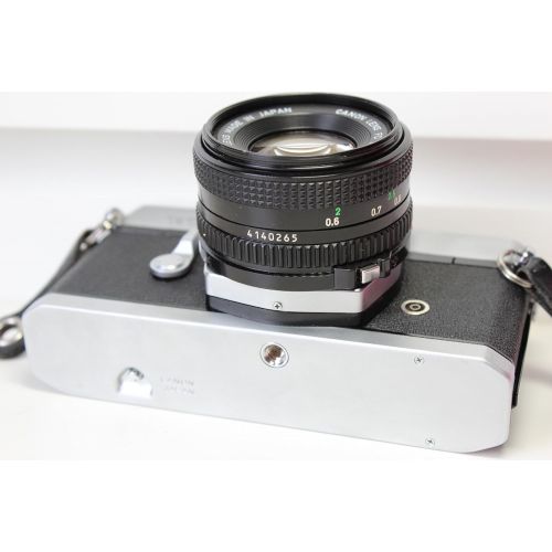 캐논 Canon TX 35mm Film Camera with Canon FD 50mm Lens