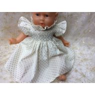 /CelestineBordeaux dress polka dots and silver smocked doll 30 cm