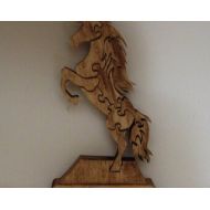 CountryTimber Horse Puzzle made from solid, pine. It is handmade, solid wood; can be easily taken apart and put back together. Great for any shelf.