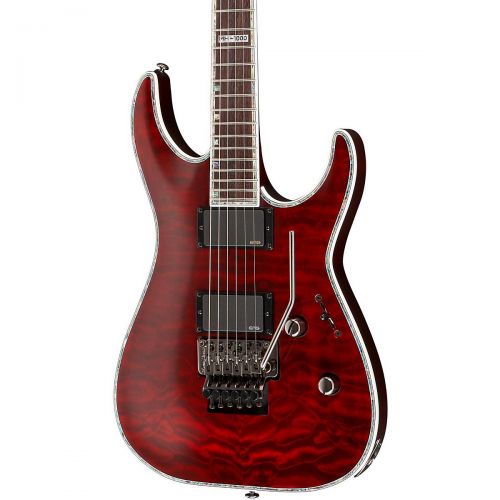  ESP},description:The ESP LTD Deluxe MH-1000 electric guitar features a set-thru 3-piece maple neck, mahogany body with gorgeous carved maple top, and a rosewood fretboard. The thin