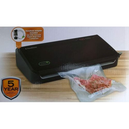  Deluxe FoodSaver FM2105 System with Handheld Sealer Vacuum accessory, includes 1 Starter Roll, 5 Seal Bags, 8 Zipper Bags, Black