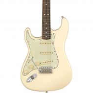 Fender},description:As the world changed in the 60s, the Strat changed, too. It mellowed out with a smooth rosewood fretboard and the look of a mint green pickguard, but still main
