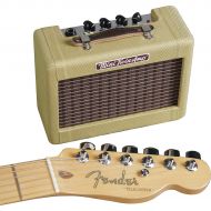 Fender},description:The Mini 57 Twin is a super-cool little jammer with a realistic vintage visual vibe. The genuine tweed-covered wood cab contains built-in distortion; power, vol