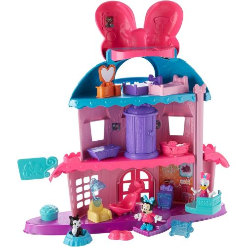  Fisher-Price Minnie Mouses Home Sweet Headquarters is a 4 level dollhouse playset with five rooms of play and features three figures, 12 play pieces, an elevator, and Minnies magic Turnstyler f