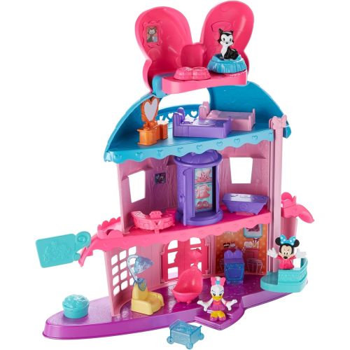  Fisher-Price Minnie Mouses Home Sweet Headquarters is a 4 level dollhouse playset with five rooms of play and features three figures, 12 play pieces, an elevator, and Minnies magic Turnstyler f