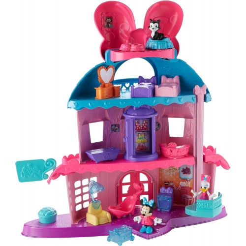  Fisher-Price Minnie Mouses Home Sweet Headquarters is a 4 level dollhouse playset with five rooms of play and features three figures, 12 play pieces, an elevator, and Minnies magic Turnstyler f