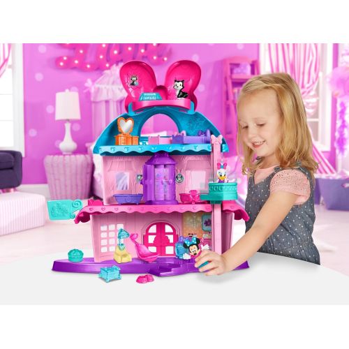  Fisher-Price Minnie Mouses Home Sweet Headquarters is a 4 level dollhouse playset with five rooms of play and features three figures, 12 play pieces, an elevator, and Minnies magic Turnstyler f