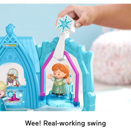  Fisher-Price Disney Frozen Arendelle Winter Wonderland by Little People, ice skating playset with Anna and Elsa figures for toddlers and preschool kids, Blue