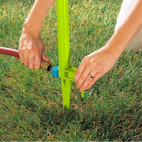  Fisher-Price Spin & Spray Sprinkler Turtle, kids sprinkler toy for outdoor water play for ages 3 years and up