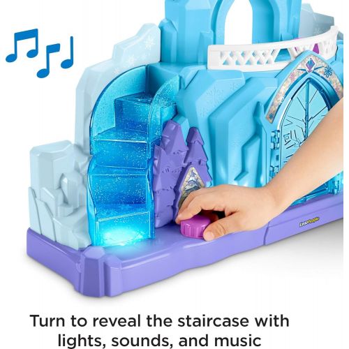  Fisher-Price Disney Frozen Elsas Ice Palace by Little People, Musical Light-Up Playset Featuring Elsa and Olaf, Dazzling Lights, Sounds, and the Hit Song, Let It Go!