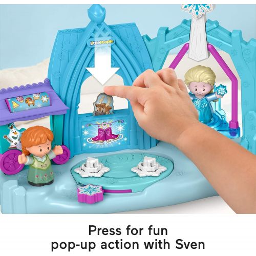  Fisher-Price Disney Frozen Arendelle Winter Wonderland by Little People, ice skating playset with Anna and Elsa figures for toddlers and preschool kids