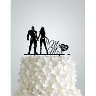 Frog Studio Home Acrylic Wedding cake Topper inspired by Iron Man and Wonder woman