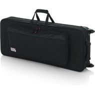 Gator Lightweight Case with Retractable Pull Handle and Wheels Fits Standard 49 Note Keyboards and Electric Pianos (GK-49) Black