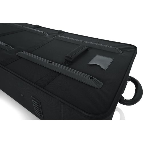  [아마존베스트]Gator Lightweight Case with Retractable Pull Handle and Wheels Fits Standard 49 Note Keyboards and Electric Pianos (GK-49)
