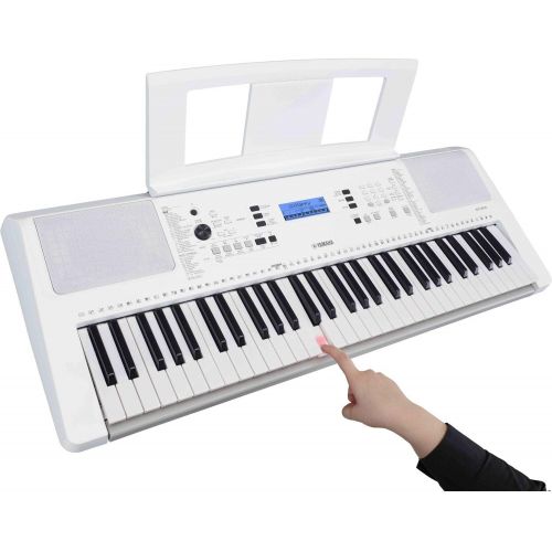  Genesis Bundle Yamaha EZ-300 61-Key Portable Keyboard with Lighted Keys Bundled with Power Supply, Foot switch, Stereo Headphones, and 2-Year Extended Warranty