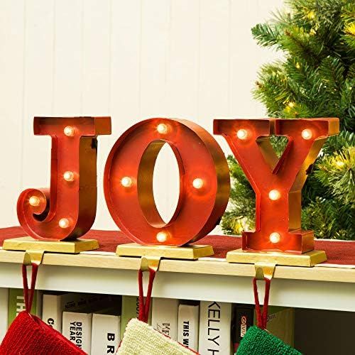  glitzhome 8.5 H Christmas Stocking Holders for Mantle Metal Marquee LED Joy Stocking Holder Stocking Hangers Battery Operated Decorative Fireplace Stocking Holders Seasonal Decor