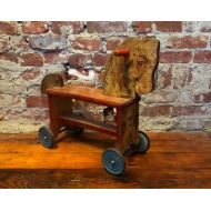 Goldfindsvintage Vintage Wooden Riding Horse with Noise Making Wheels by The Gong Bell MFG Co