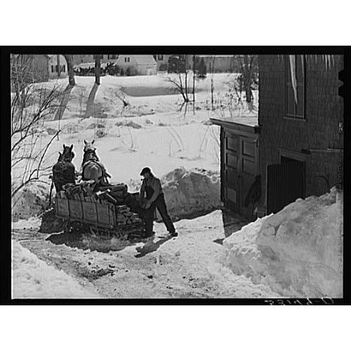  HistoricalFindings Photo: Unloading Stove Wood from sled woodshed. Woodstock,Vermont