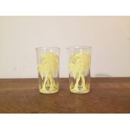 /HobAndNail Two Yellow Tropical Palm Trees Swanky Swig Juice Glasses by Hazel Atlas