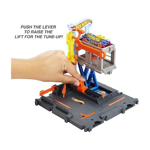  Hot Wheels City Toy Car Track Set Downtown Repair Station Playset with 1:64 Scale Vehicle, Working Lift & Launcher