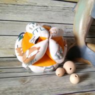 /Etsy Montessori motility ball for babies in Pure Cotton and orange cotton jersey with foxes, owls and forest fantasy.