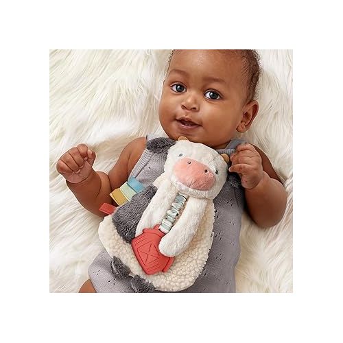  Itzy Ritzy - Itzy Lovey Including Teether - Baby Lovey with Teether, Textured Ribbons & Dangle Arms - Features Crinkle Sound, Sherpa Fabric and Minky Plush (Cow)