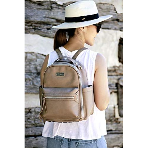  [아마존베스트]Itzy Ritzy Mini Diaper Bag Backpack  Chic Mini Diaper Bag Backpack with Vegan Leather Changing Pad, 8 Total Pockets (4 Internal and 4 External), Grab-Top Handle and Rubber Feet, T