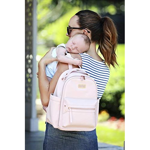  Itzy Ritzy Mini Diaper Bag Backpack  Chic Mini Diaper Bag Backpack with Vegan Leather Changing Pad, 8 Total Pockets (4 Internal and 4 External), Grab-Top Handle and Rubber Feet, B