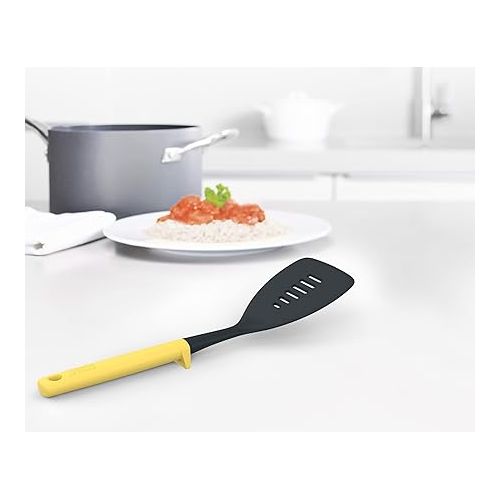 조셉조셉 Joseph Joseph Duo Slotted Turner with Integrated Tool Rest: Hygienic, Heat-Resistant Nylon Head, Safe for Non-Stick Cookware, Light Yellow