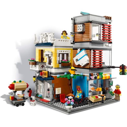  LEGO Creator 3 in 1 Townhouse Pet Shop & Cafe 31097 Toy Store Building Set with Bank, Town Playset with a Toy Tram, Animal Figures and Minifigures (969 Pieces)