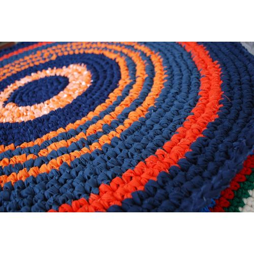  La Rugs Boutique Orange and blue handmade circle rug I crocheted it to have the lines run around the entire piece. It is reversible. Old unwanted sheets and made them into something new. Rugs are m
