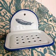 /LouTonkin Enamel Soap dish with a lino cut design feather.
