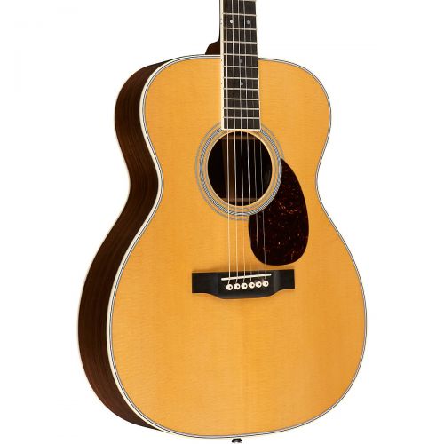  Martin},description:The OM-35E Orchestra Model Acoustic-Electric Guitar is compact and commanding. Its tight-wasted body delivers a nice, even tone across the entire musical spectr