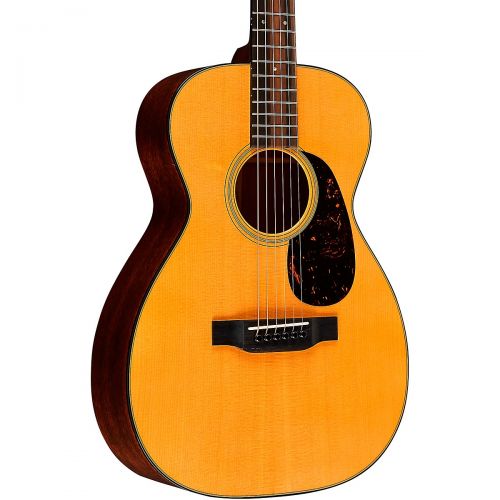  Martin},description:A welcome addition to the Standard Series, the Martins 0-18 has a scallop-braced Sitka spruce top with mahogany back and sides that serve as the solid foundatio