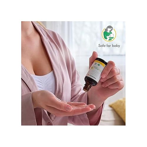 메델라 Medela Organic Breast Massage Oil for Breastfeeding Mothers | Relieve Breast Tenderness and Fullness | All-Natural Formula with Nourishing Ingredients I Warming Relief, 1.69 fl. oz.