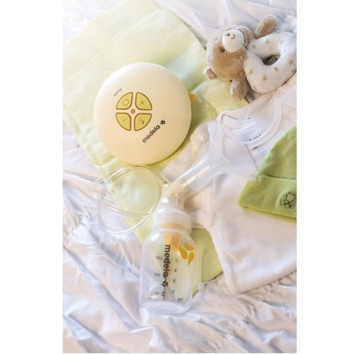 메델라 Medela, Swing, Single Electric Breast Pump, Compact and Lightweight Motor, 2-Phase Expression Technology, Convenient AC Adaptor or Battery Power, Single Pumping Kit, Easy to Use Va