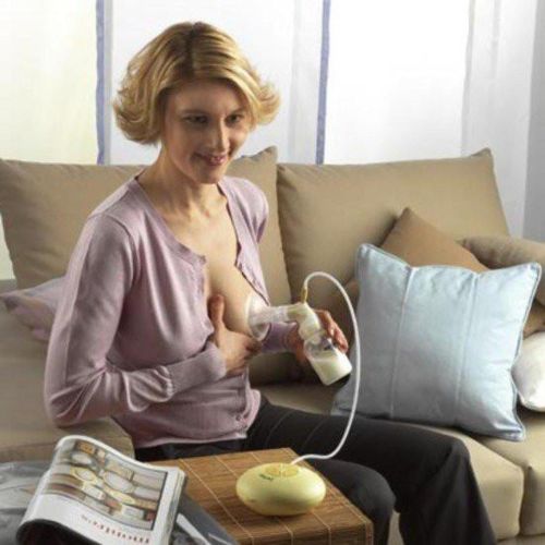 메델라 Medela, Swing, Single Electric Breast Pump, Compact and Lightweight Motor, 2-Phase Expression Technology, Convenient AC Adaptor or Battery Power, Single Pumping Kit, Easy to Use Va