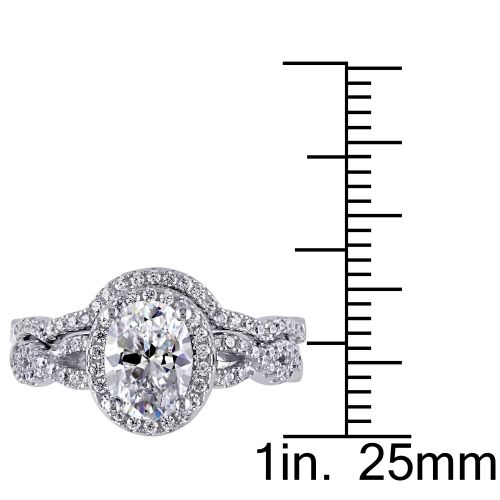  Miadora Sterling Silver Oval and Round-cut Cubic Zirconia Halo Bridal Ring set by Miadora