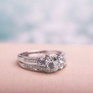 Miadora 10k White Gold Created White Sapphire and 1/6ct TDW Diamond 3-stone Bridal Ring Set (G-H, I2 by Miadora