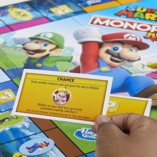 모노폴리 MONOPOLY Junior Super Mario Edition Board Game, Fun Kids Game Ages 5 and Up, Explore The Mushroom Kingdom as Mario, Peach, Yoshi, or Luigi